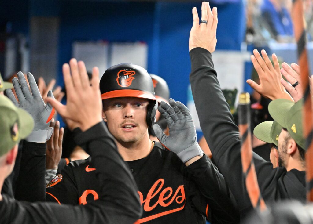 Baltimore Orioles' Adam Frazier and Blue Jays' Alek Manoah