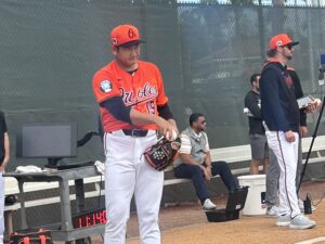 Sugano throws to Orioles hitters in 1st live batting practice